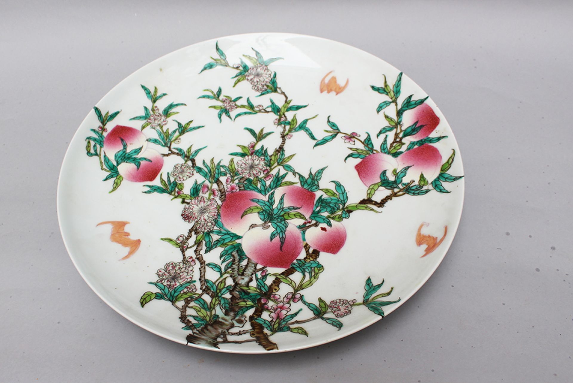 Chinese porcelain dish painted with peaches and bats on white ground glazed four sign mark Qing