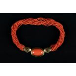 Coral necklace with 20 lines gold mount 750 and a gold pendant with large coral, goldsmith Becker.