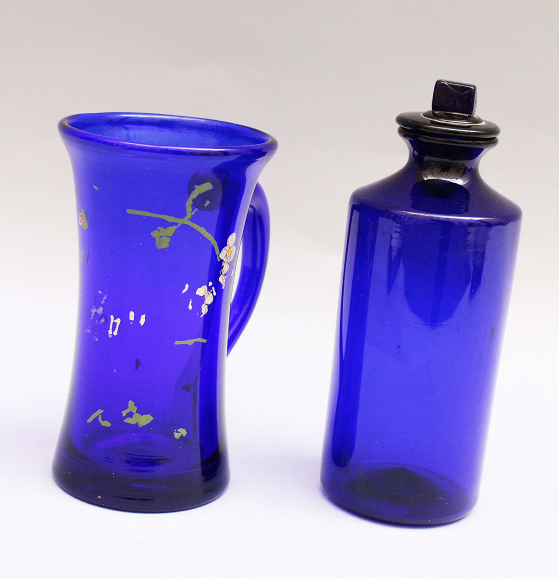 Blue glass Stein , with remains of collours, 19. century, 16 cm high and Apothecary flask in blue