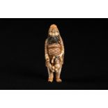 Netsuke, I. carved with man and baby; master script signs. 6.6cm