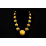 Silver necklace with amber. Length closed 24.5cm. 84g.
