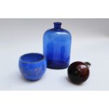 Lot of 3 glasses: a blue bottle and a blue bowl and a brown hanging bowl; all 19th Century,