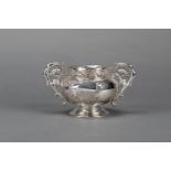 Two handled silver cup, round shape with floral decorations open work border, Chinese hallmarked,