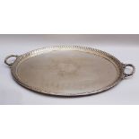 Large oval Silver tray, two handgrips, fluted and turned border in the centre monogrammed P and