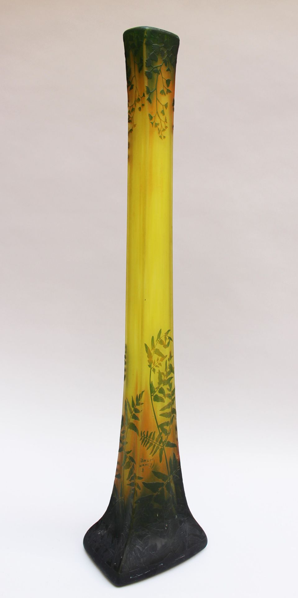 Daum (1890-1919) Nancy, Large glass Vase with long neck on shaped rectangular base green glass with 