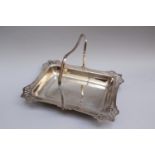 Silver plated basket in rectangular shape with movable grip open work around 1900.