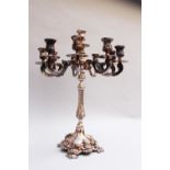 Large Silver Candelabra with 10 spouts for candles and nine branches , central feed on four curved