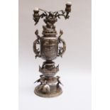 Meiji Bronze candelabra, for two lights , central vase on three dragon feet on round base with