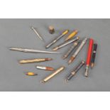 lot of 13 pen holders, fillers in different styles, age and materials, partly hallmarked,