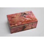 Rectangular half precious stone box, in pink colour with black and grey veins, one lid to be opened,