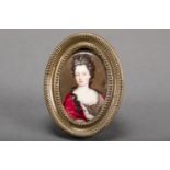 Miniature, Portrait of a court Lady with draped hair in red coat , painted in oval around 1700 in
