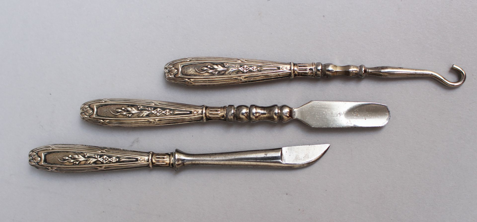 3 silver miniature finger Instruments, decorated 19. century
