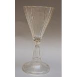 Spa beaker, with transparent cut and canted glass on one central foot, in the centre described