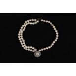 Pearl bracelet with three lines of akoya pearls of 8 mm diameter, white gold 750 clasp with diamonds