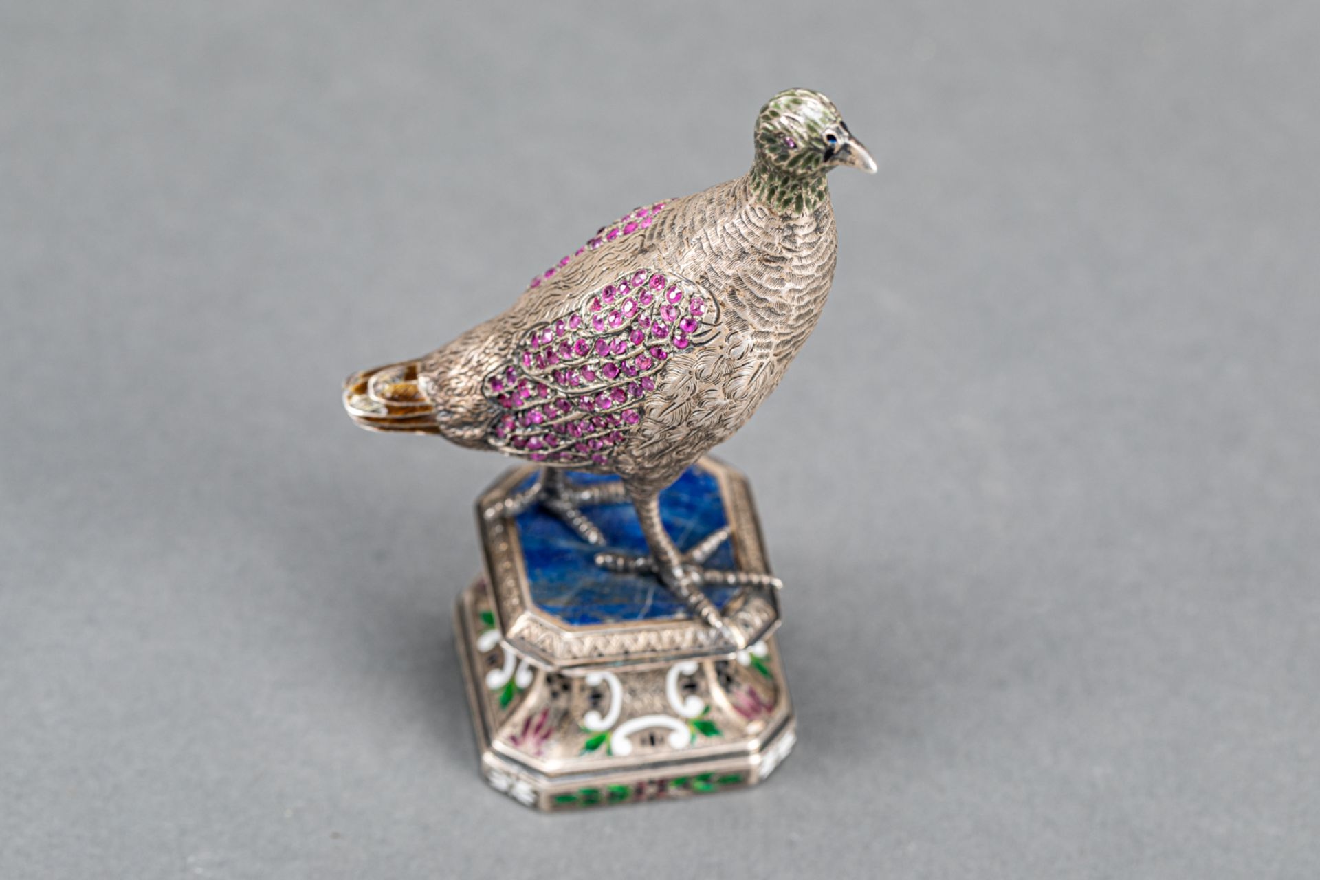 Pheasant sculpture, on octagonal base with lapislazuli top, silver with rich enamel decorations