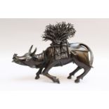 Asian Water buffalo carrying wood , bonze cast with original patina, partly engraved, parts missing,
