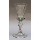 Transparent glass goblet with one foot and etched engraved motto “ besser entzwei als untreu “