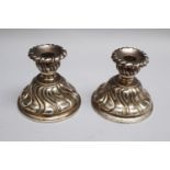 Two silver candle sticks, hall marks; 280g; 835/1000. 8 cm height.