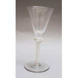 Drink glass, one central foot with transparent glass and white spiral decorations; 18th Century. 17,