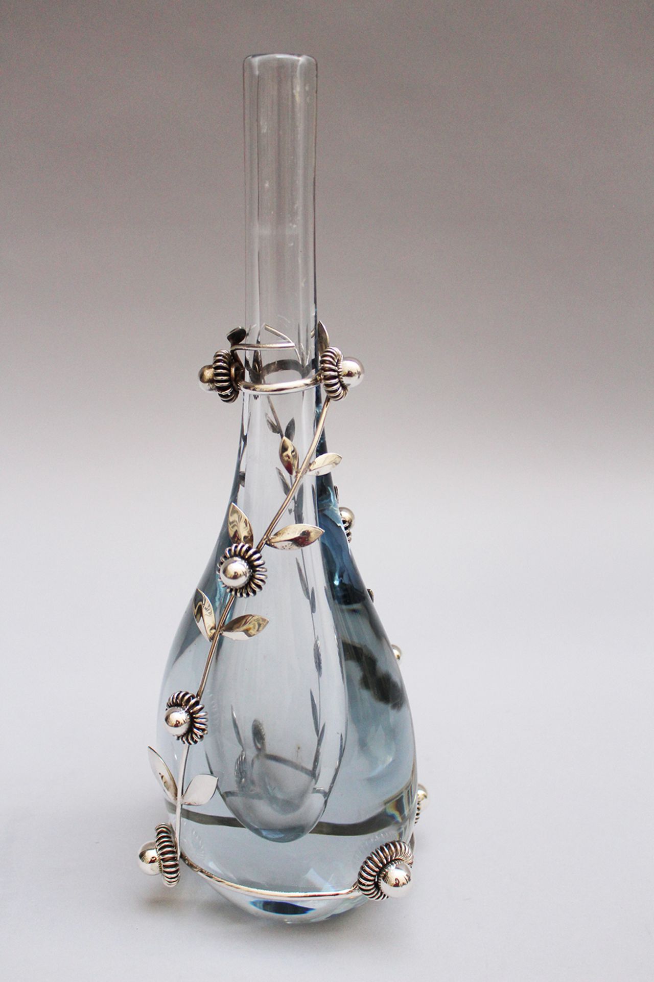 Blue toned transparent glass vase, with silver flowers on it, silver 925/1000 from Koch & Berfeld