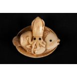 Netsuke, I. carved with squids and other fishes; master script signs. 4,8cm