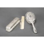 Silver coiffeur set with two brush and a comb , engraved,