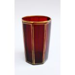 Biedermeier glass beaker, canted with red transparent glass partly gilded around 1830. height 11cm.