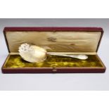 French gold plated silver Art Nouveau “strawberry” spoon; hall marked, master signed L G/C; 950/
