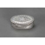 Silver snuff box, oval shape with engraved floral and ornamental decorations; inside gilded,