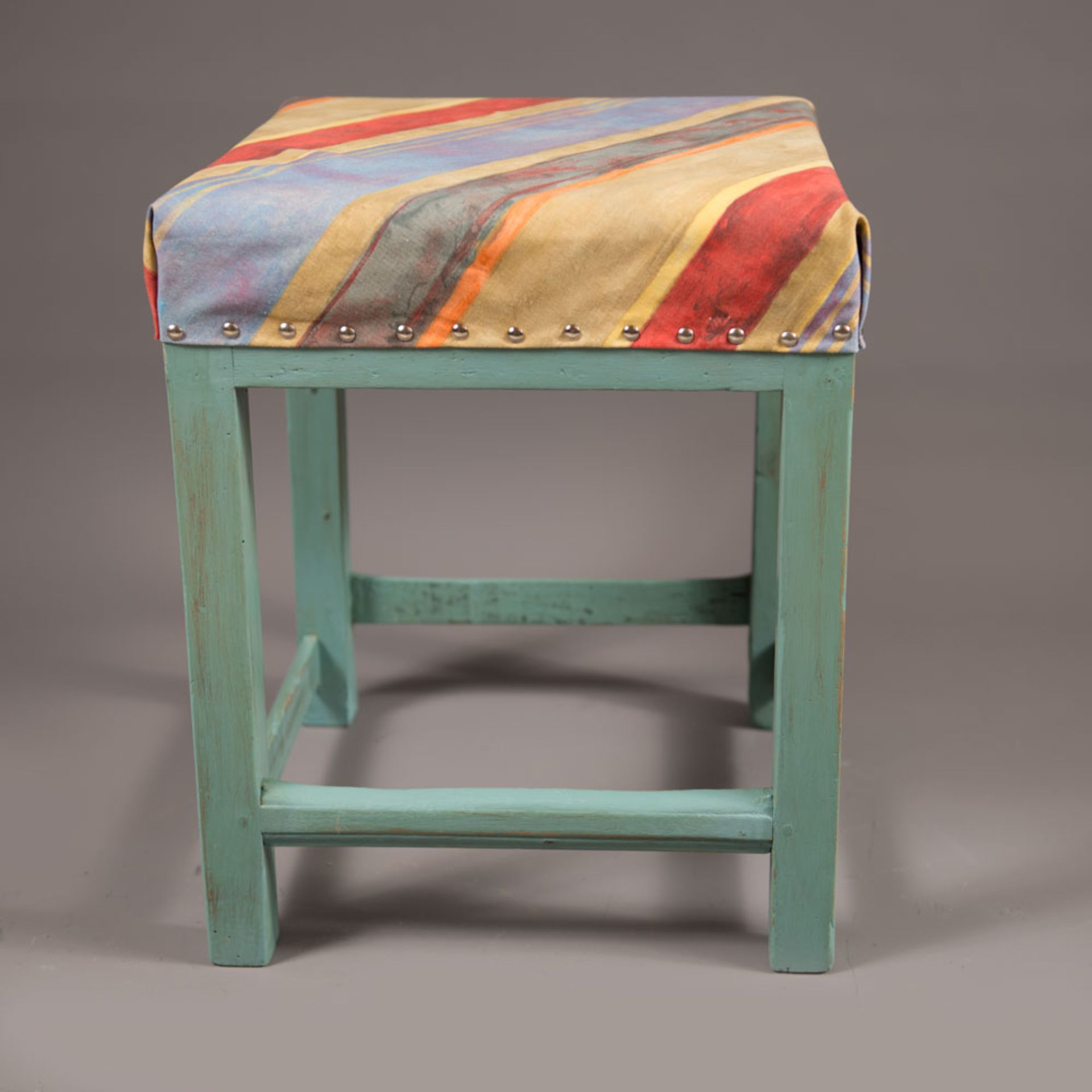A shabby chic decorated stool