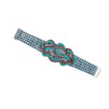 BRACELET SEMI-ARTICULÉ EN PLATINE, EN OR DE DEUX TONS, TURQUOISES, RUBIS, AIGUES-MARINES ET DIAMANTS