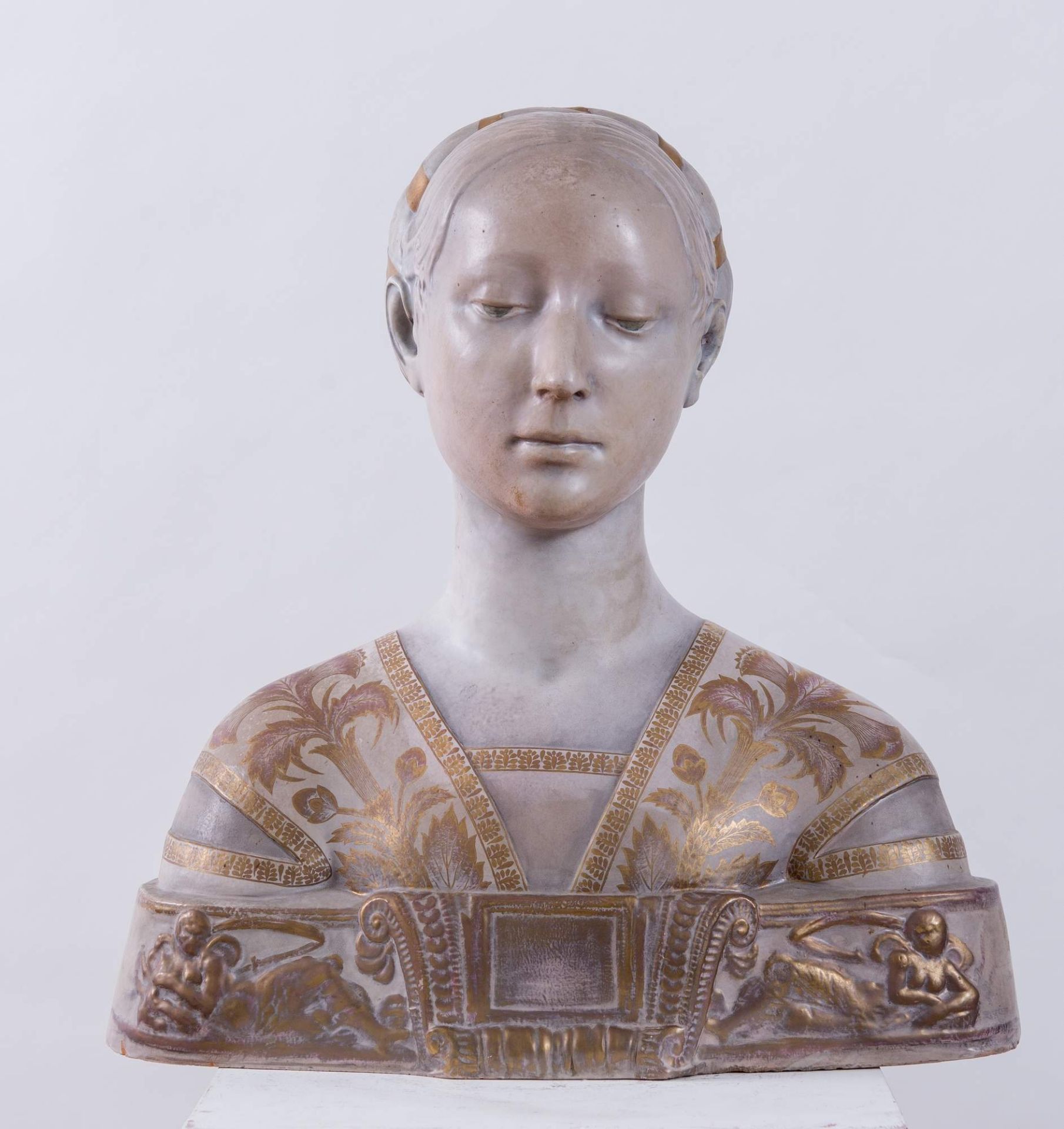 PIETRO MELANDRI (Faenza 1885 - 1976) “Busto di fanciulla”. Scultura in ceramica policroma. Cm