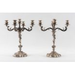 PELLEGRINI, Firenze, XX secolo. Coppia di candelabri in argento 800. Sul bordo inferiore recano punz