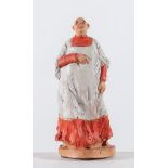 CARLO ANLERI (Vergato 1943 - 2015) "Cardinale". Scultura in terracotta policroma. Opera firmata alla