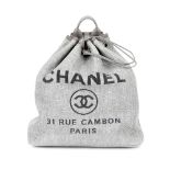 "Deauville Backpack" - Chanel backpack, raffia, grey, authenticity card and original cover