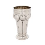 Swiss workshop, Arts & Crafts silver cup, partly gilded, decorated with poppies, bearing an annivers