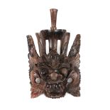 Mask representing the protective god Rangda, Bali, Indonesia, part of the collection of museologist