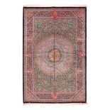Qum silk rug, decorated with abundant floral motifs, Iran