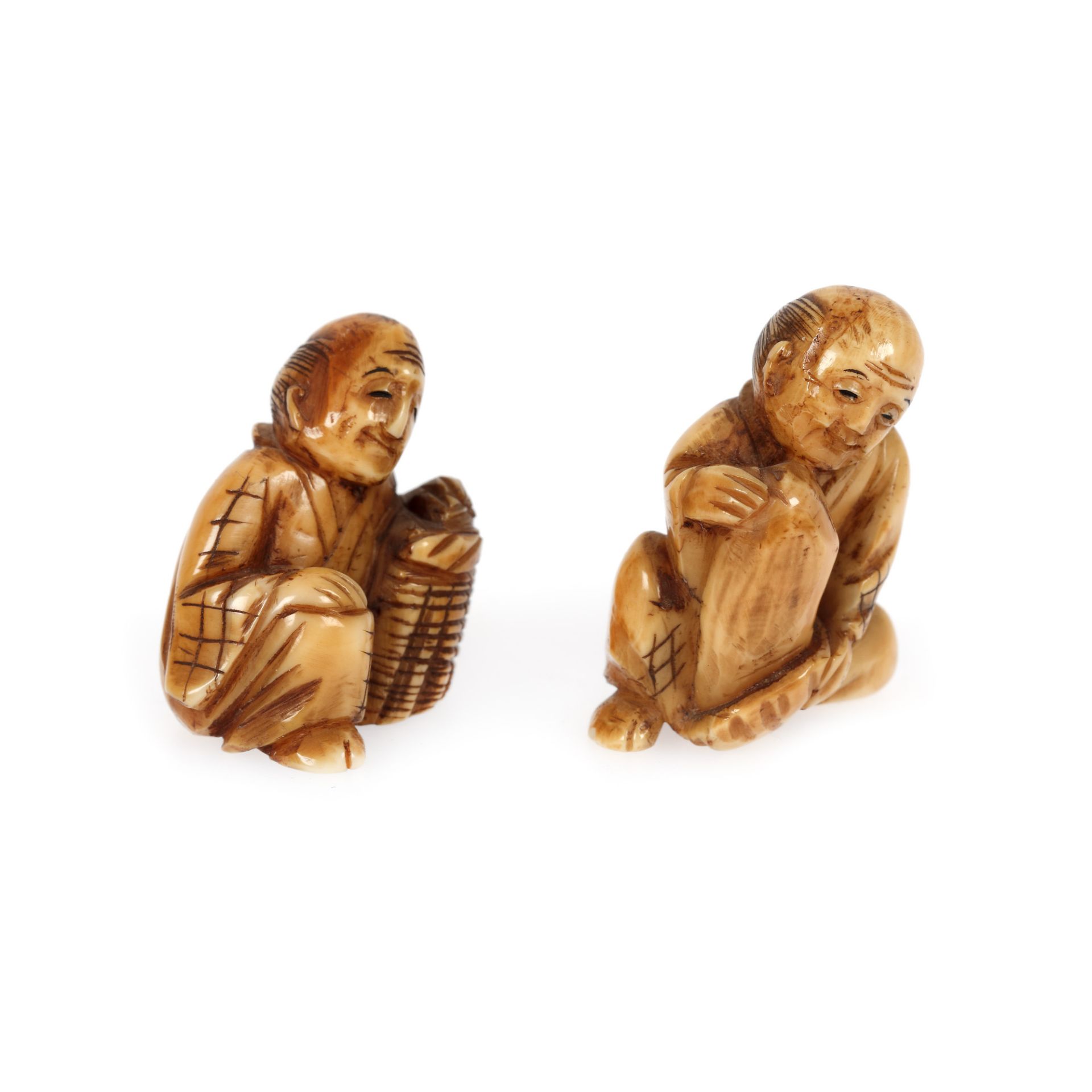 Pair of ivory netsuke, depicting two tormented men, Japan, late 19th century - Image 2 of 4