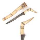 Dagger with engraved bone handle and sheath, Sumatra, 19th century