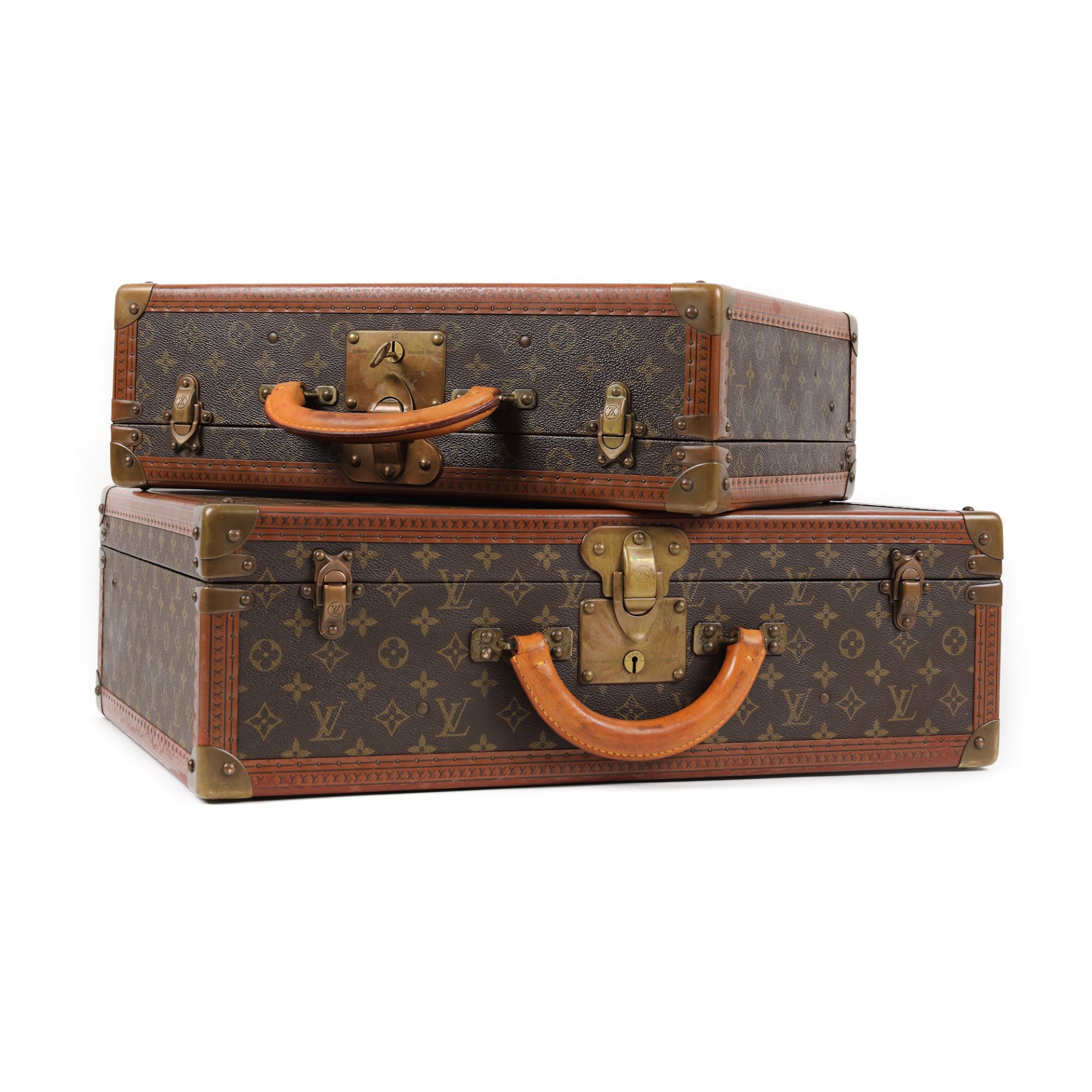 Pair of Louis Vuitton suitcases for travel