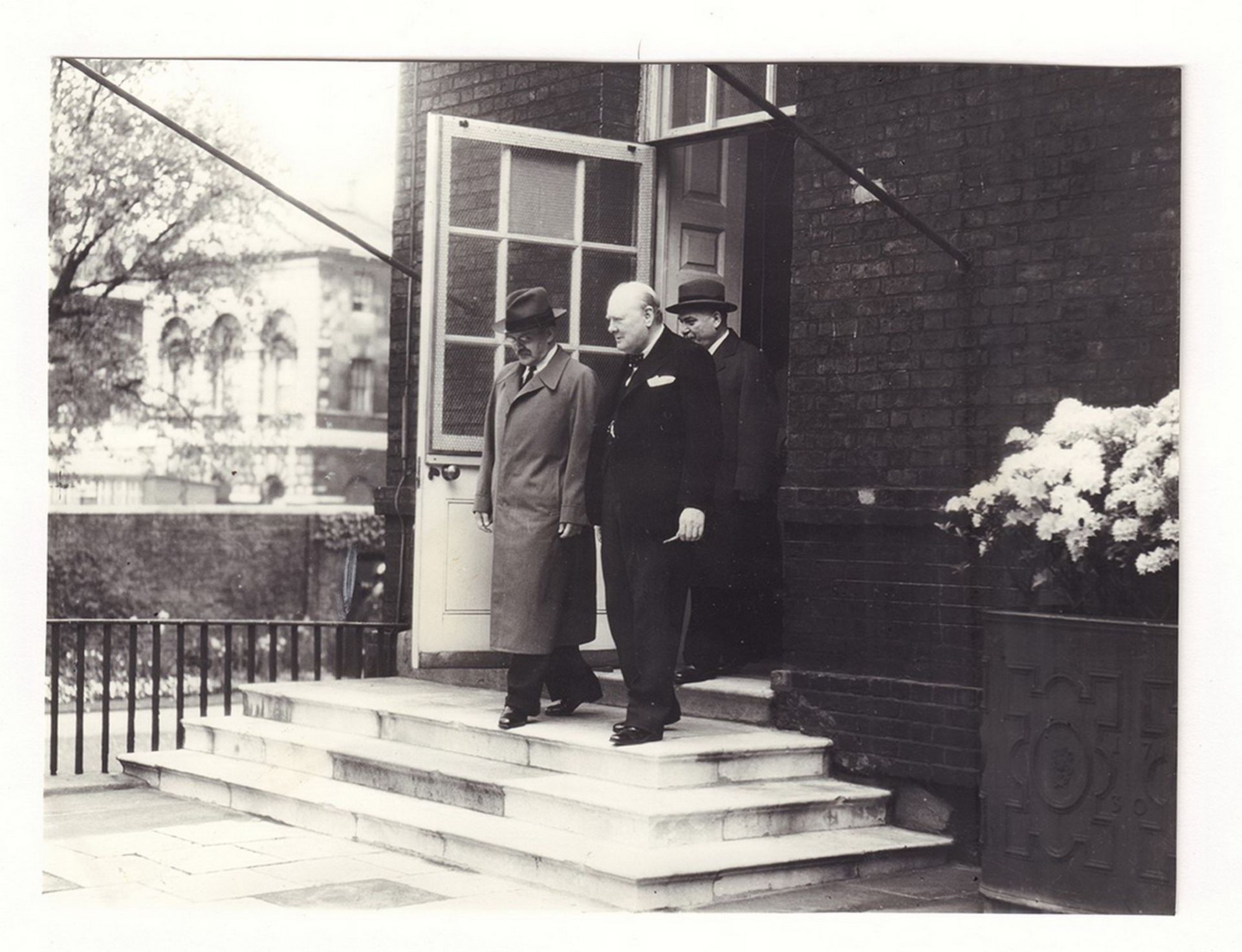 [Soviet]. V. Molotov, W. Churchill and USSR Ambassador in Great Britain I. Maysky. Photograph. 14x19