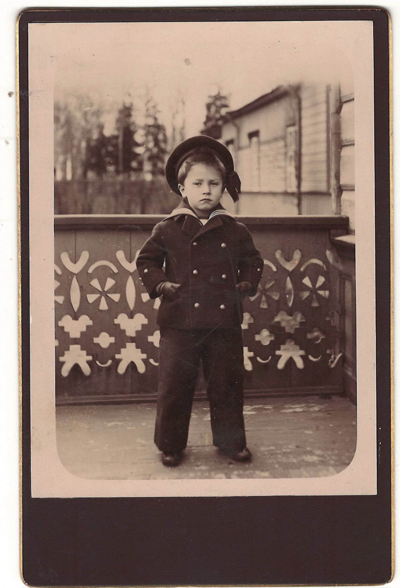 Portrait of a boy in a navy uniform. Photograph. Vintage print. The first half of the 20th century.<