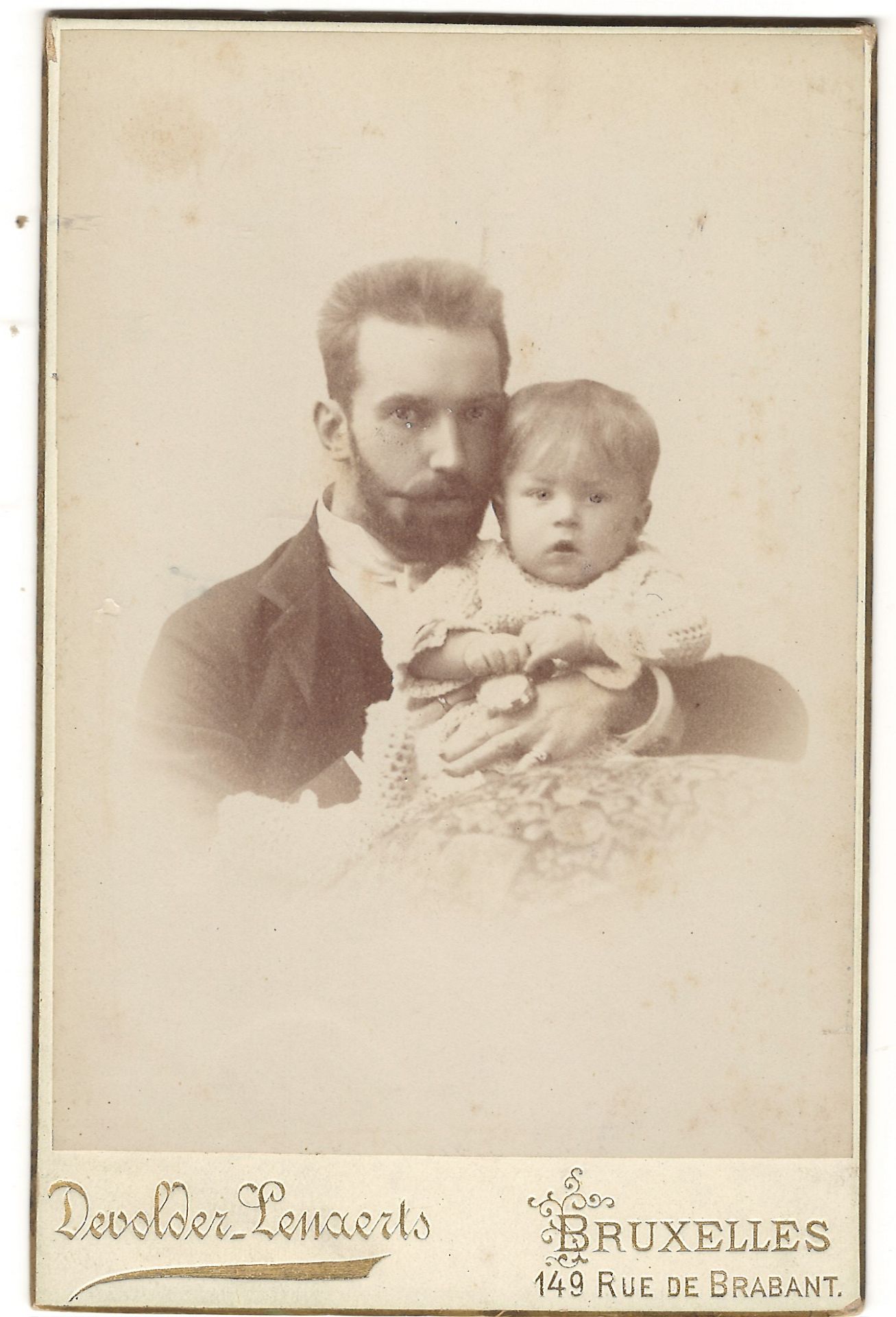 [Russian Empire]. Cabinet portrait of I. Peterson with his son Dmitri. Photograph. Original print. [