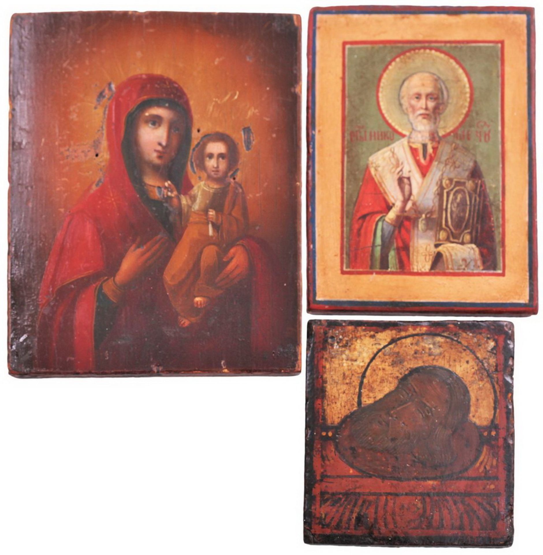 Three icons. Smolenskaya Mother of God. Saint Nicholas Wonderworker. Beheading of John the Forerunne