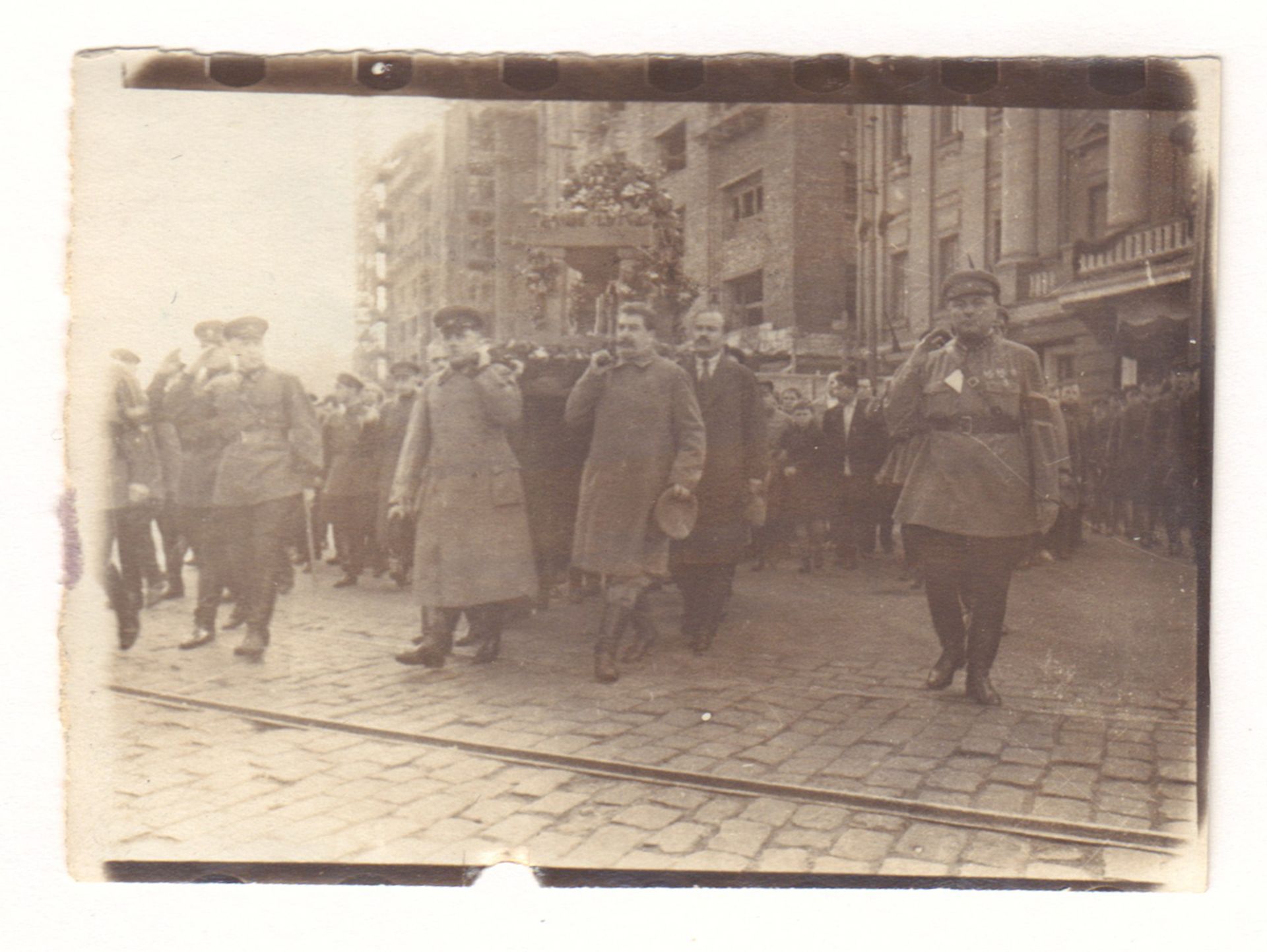 [STALIN. Soviet]. Photograph "K. Voroshilov, Joseph Stalin, V. Molotov and others are carrying a mor