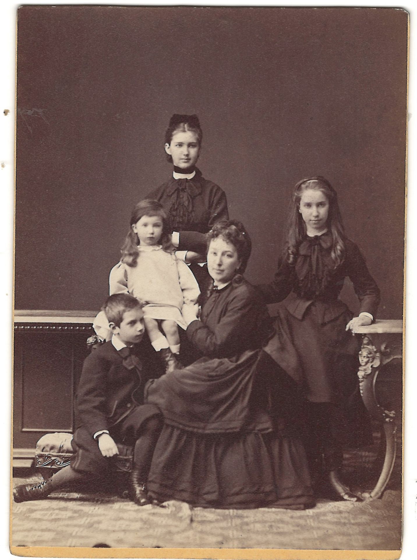 [Russian Empire]. Cabinet portrait of M.I. Peterson with his children. Photograph. Original print. [