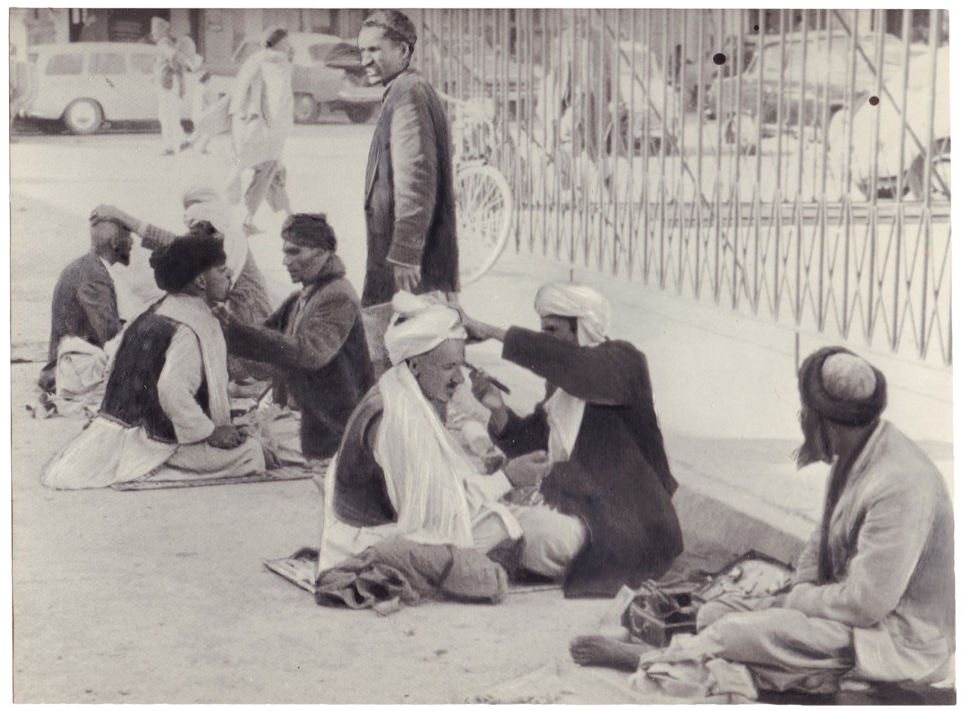 [Soviet–Afghan War]. Photograph "Street shavers". Original print. 1983. 10,2x13,7 cm.