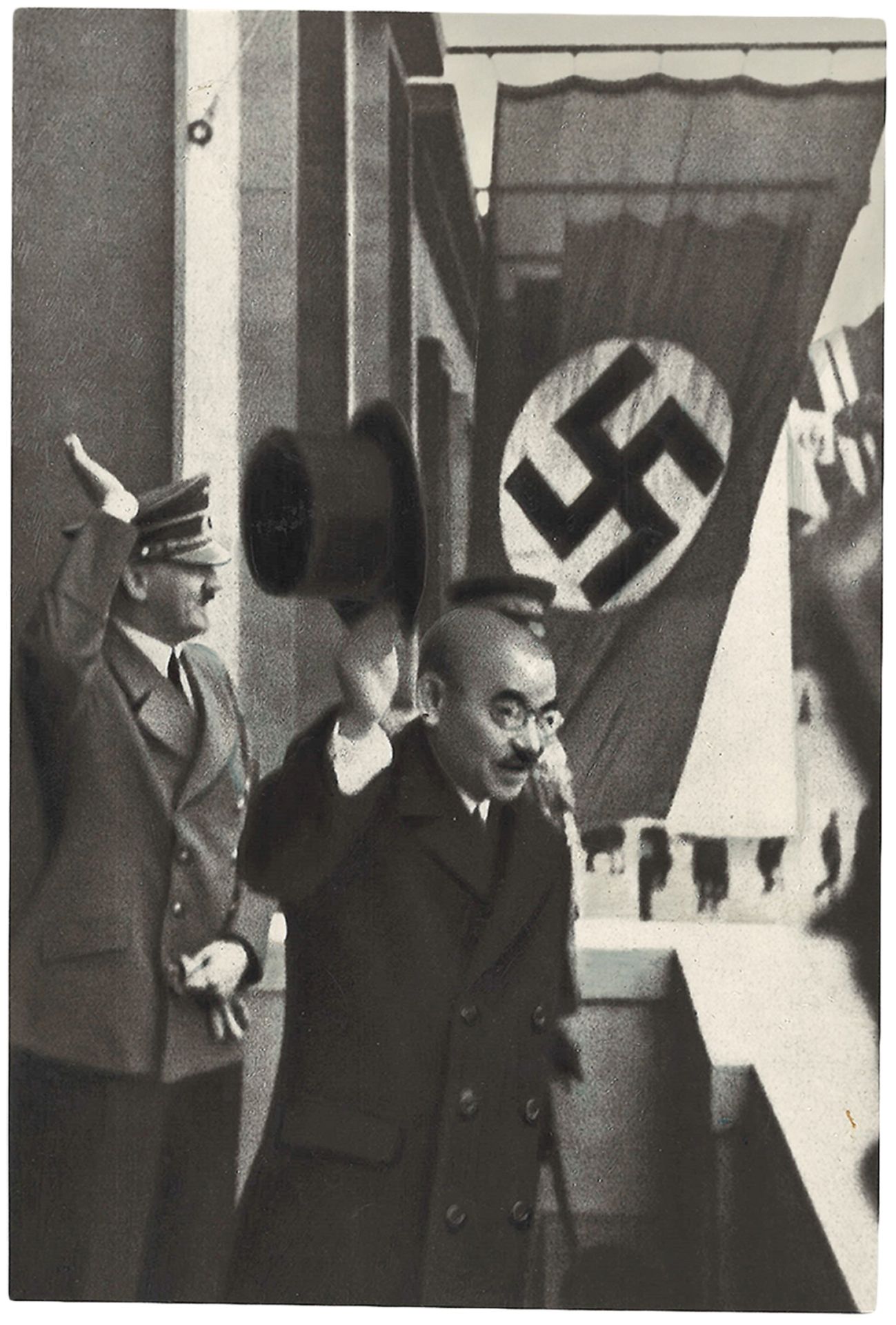 Hitler and Matsuoka after negotiation are greeting Nazi demonstration from a balcony. Berlin. March