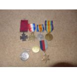 A COLLECTION OF WORLD WAR I AND WORLD WAR II MEDALS AND A COPY V.C.